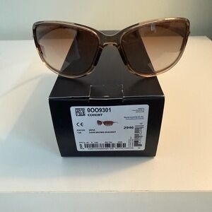 Oakley Women’s Cohort Sunglasses. Translucent Brown frames and lenses.